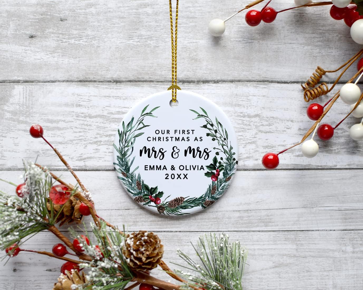 Andaz Press Personalized Our First Christmas As Mrs. & Mrs. 2025 Christmas Ornaments Holly & Pinecone Wreath 2.8" Round Porcelain Ceramic Lesbian Married Couple Gay Women Wedding Keepsake 1-Pack